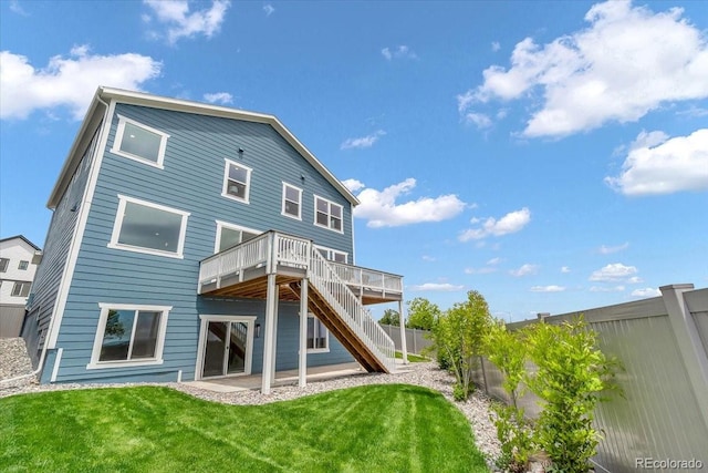 900 Eldorado Ln, Louisville, CO 80027 - back of house featuring a deck, stairs, and a fenced backyard