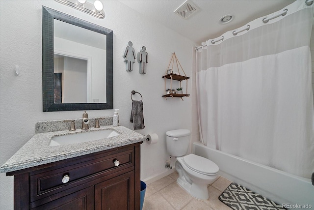 bathroom featuring shower / bath combo, visible vents, toilet, tile patterned flooring, and vanity