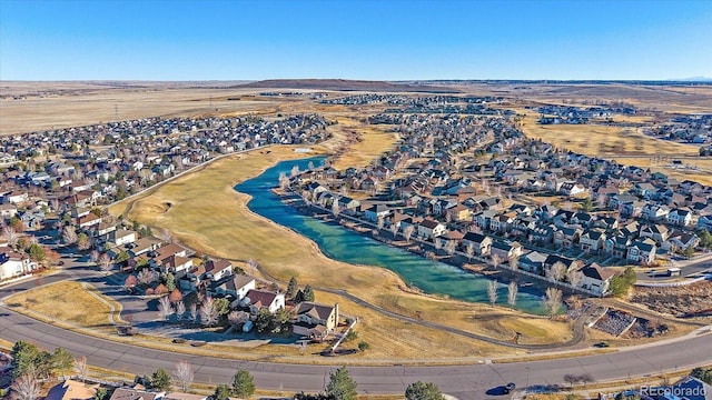 aerial view featuring a residential view and a water view