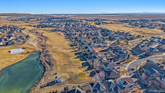 birds eye view of property with a residential view