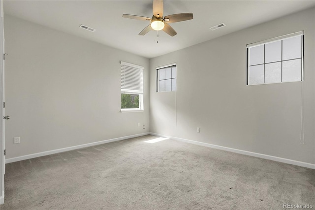 23895 E Rocky Top Pl, Aurora, CO 80016 - spare room with a ceiling fan, carpet flooring, and baseboards
