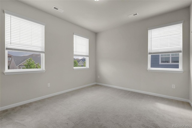 23895 E Rocky Top Pl, Aurora, CO 80016 - spare room featuring healthy amount of natural light and carpet