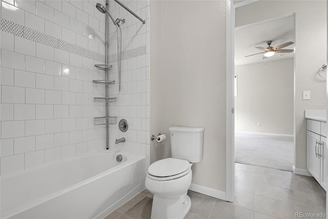 23895 E Rocky Top Pl, Aurora, CO 80016 - bathroom featuring toilet, vanity, baseboards, tub / shower combination, and ceiling fan