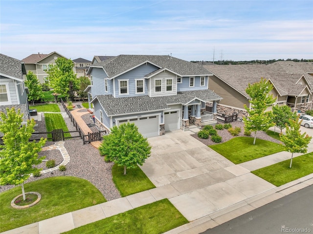 23895 E Rocky Top Pl, Aurora, CO 80016 - craftsman-style home with a garage, a gate, driveway, a residential view, and roof with shingles