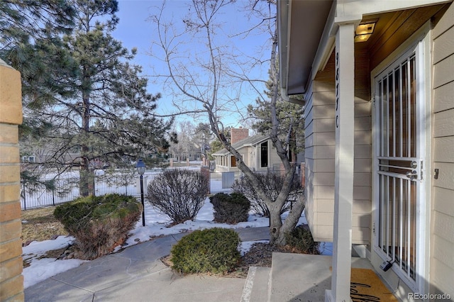 view of snow covered property