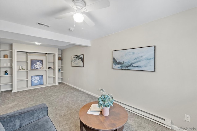 living room featuring visible vents, baseboards, carpet, baseboard heating, and a ceiling fan