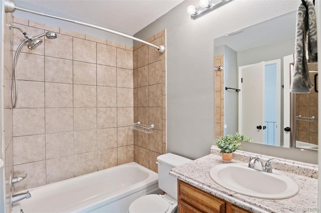 bathroom featuring shower / tub combination, vanity, and toilet