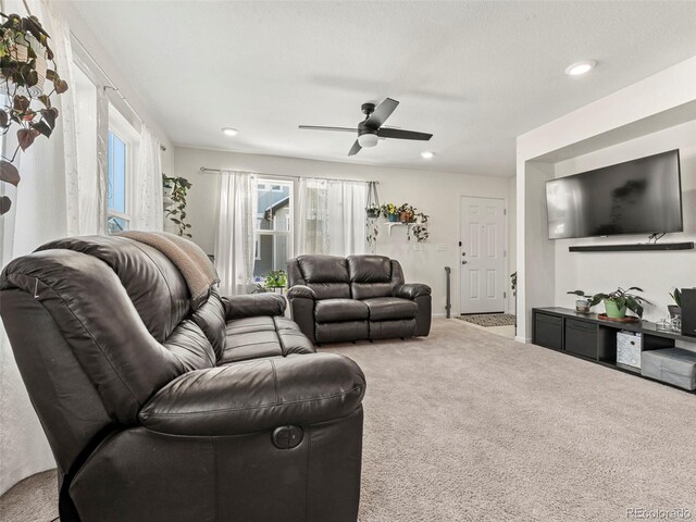 28314 E 6th Pl, Watkins, CO 80137 - carpeted living area with a ceiling fan and recessed lighting