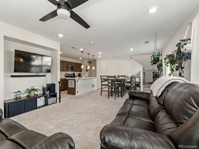 28314 E 6th Pl, Watkins, CO 80137 - living room featuring light colored carpet, a ceiling fan, and recessed lighting