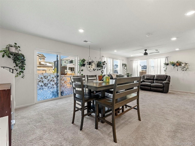 28314 E 6th Pl, Watkins, CO 80137 - dining room featuring light colored carpet, recessed lighting, baseboards, and a ceiling fan