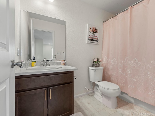 28314 E 6th Pl, Watkins, CO 80137 - bathroom with toilet, vanity, curtained shower, and baseboards