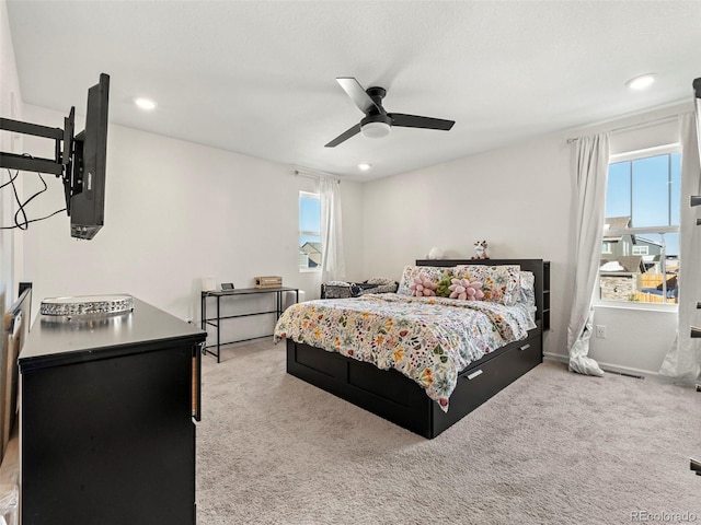 28314 E 6th Pl, Watkins, CO 80137 - carpeted bedroom with multiple windows, a ceiling fan, and recessed lighting