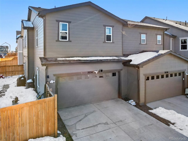28314 E 6th Pl, Watkins, CO 80137 - view of front of property featuring driveway and a garage
