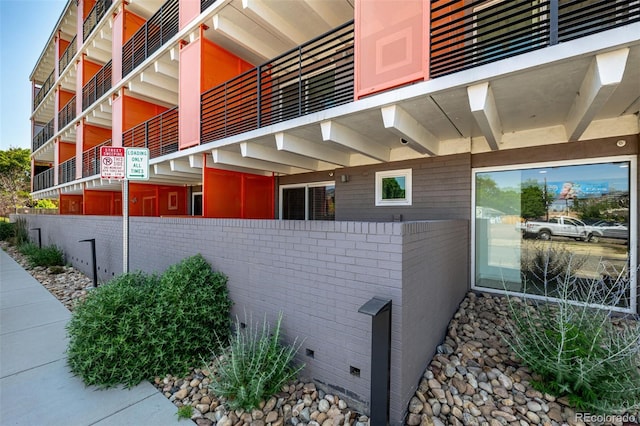 1495 Vrain St Unit 110, Denver, CO 80204 - view of side of property featuring brick siding