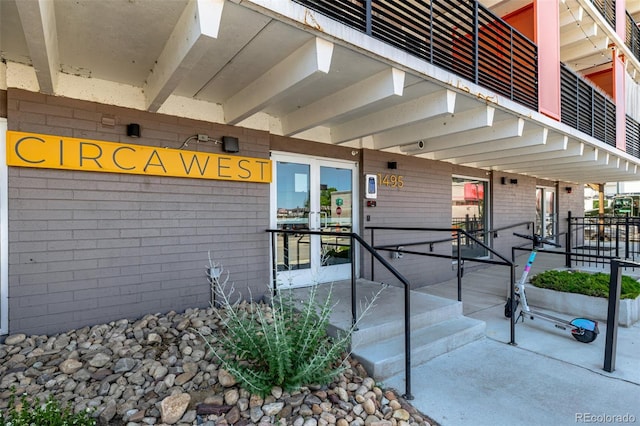 1495 Vrain St Unit 110, Denver, CO 80204 - view of exterior entry featuring brick siding