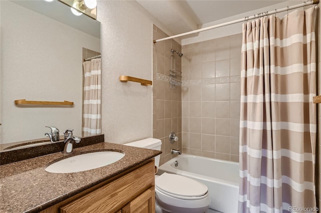 full bathroom with shower / bathtub combination with curtain, vanity, and toilet