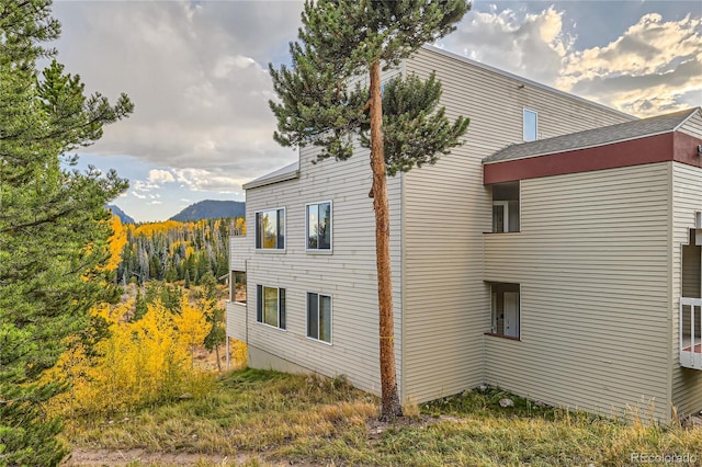 view of home's exterior featuring a mountain view