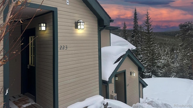 view of snow covered property