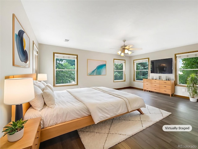 642 52nd Ave, Greeley, CO 80634 - bedroom with wood finished floors and a ceiling fan