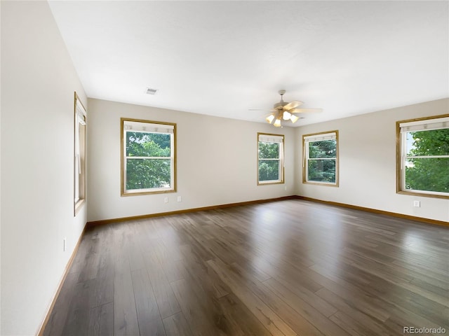 642 52nd Ave, Greeley, CO 80634 - spare room featuring dark wood-type flooring and ceiling fan