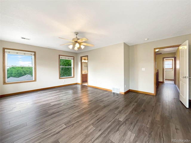 642 52nd Ave, Greeley, CO 80634 - unfurnished room with dark wood-style floors and a ceiling fan