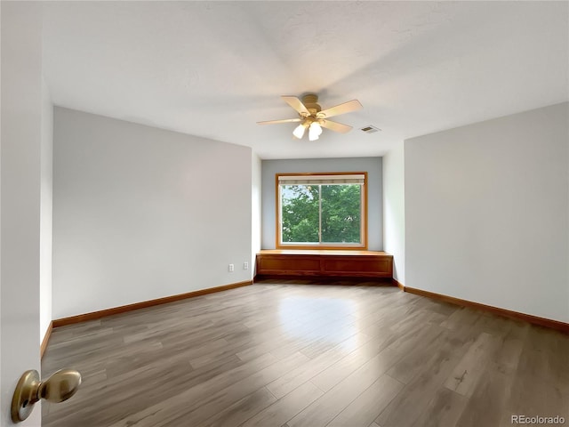642 52nd Ave, Greeley, CO 80634 - unfurnished room with ceiling fan and wood finished floors