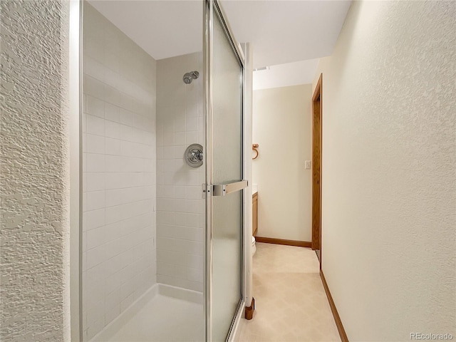 642 52nd Ave, Greeley, CO 80634 - full bath with a shower stall and a textured wall