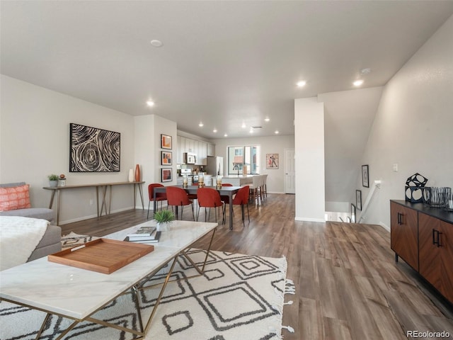 living room with hardwood / wood-style floors