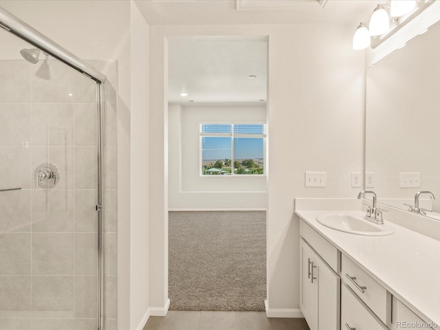 bathroom featuring vanity, an enclosed shower, and tile patterned floors