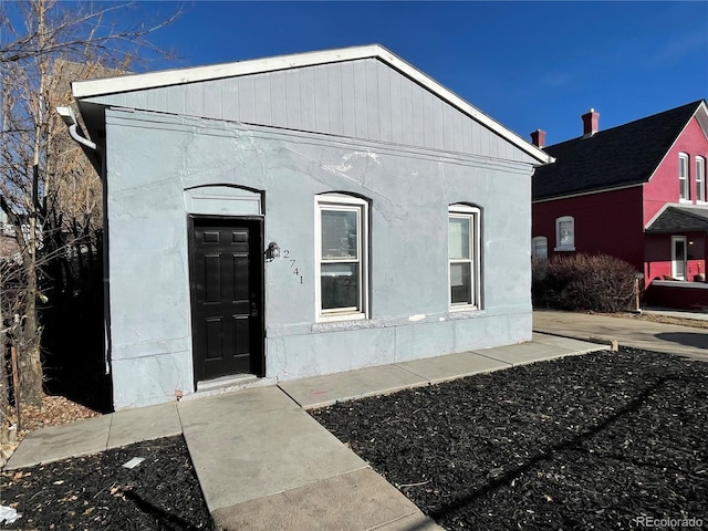 view of front of house featuring stucco siding