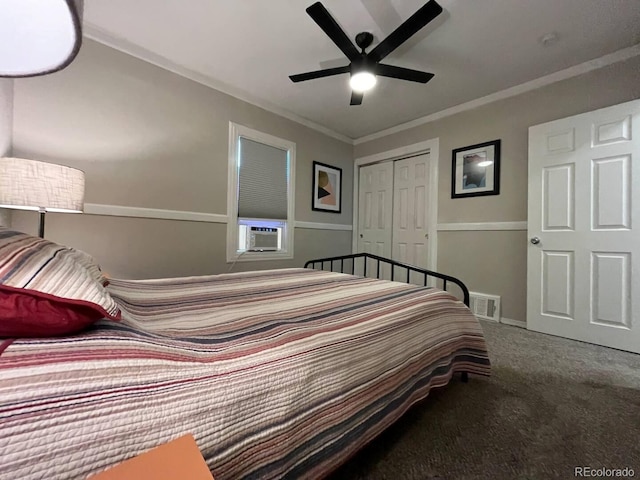 bedroom featuring ornamental molding, cooling unit, ceiling fan, carpet floors, and a closet