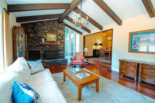8664 E Monmouth Pl, Denver, CO 80237 - living room with a chandelier, wood-type flooring, and a fireplace