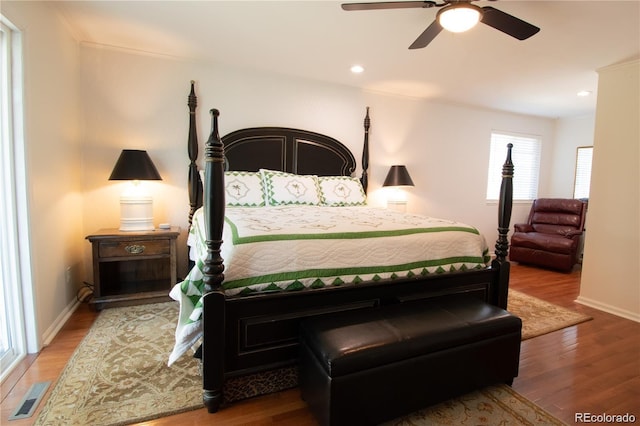 8664 E Monmouth Pl, Denver, CO 80237 - bedroom featuring wood finished floors, a ceiling fan, and recessed lighting