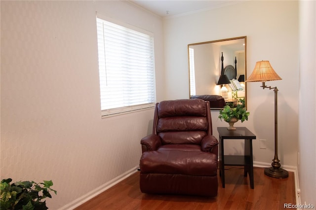 8664 E Monmouth Pl, Denver, CO 80237 - sitting room featuring wood finished floors and crown molding