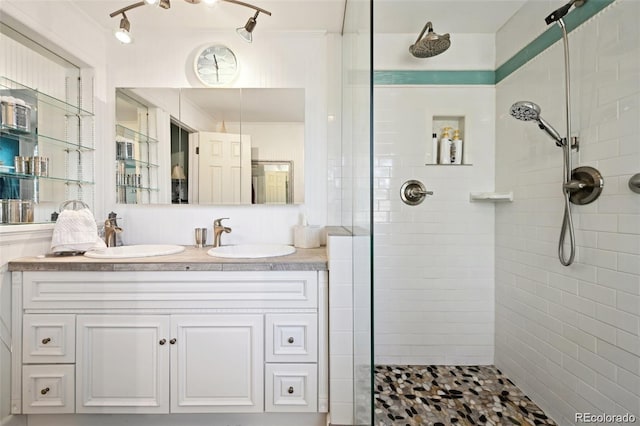 8664 E Monmouth Pl, Denver, CO 80237 - full bath featuring a tile shower and double vanity