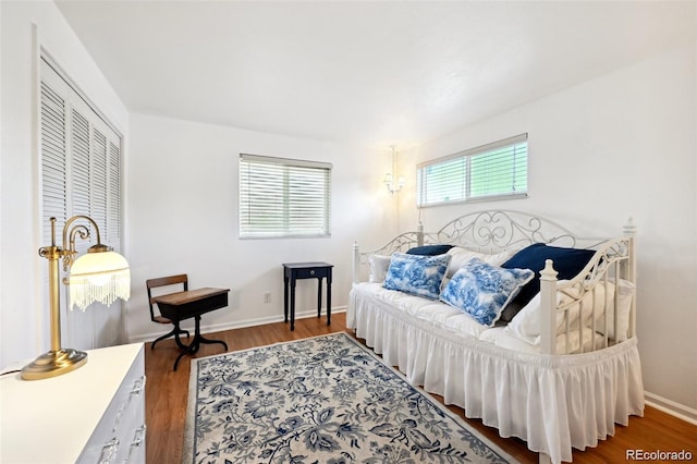 8664 E Monmouth Pl, Denver, CO 80237 - bedroom featuring wood finished floors and baseboards
