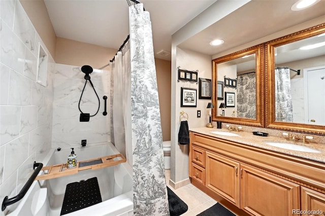 8664 E Monmouth Pl, Denver, CO 80237 - full bath featuring double vanity, tile patterned flooring, and recessed lighting