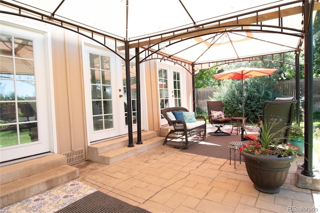 8664 E Monmouth Pl, Denver, CO 80237 - view of patio featuring entry steps, french doors, and a gazebo