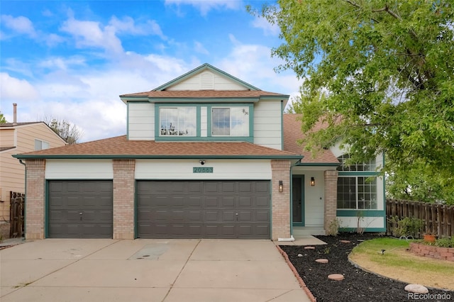 front of property with a garage