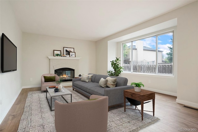 living room with light hardwood / wood-style floors