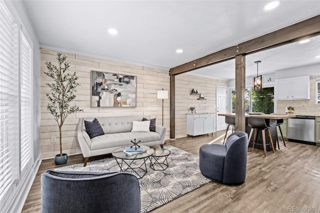 4512 S Yank St, Morrison, CO 80465 - living room featuring wood walls, recessed lighting, light wood-type flooring, and beam ceiling