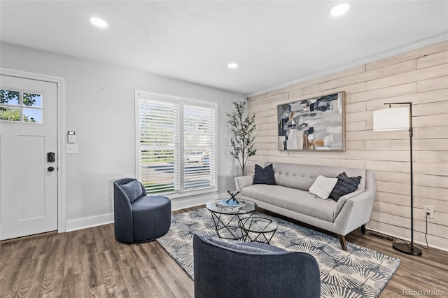 4512 S Yank St, Morrison, CO 80465 - living room with healthy amount of natural light, wood walls, wood finished floors, and recessed lighting