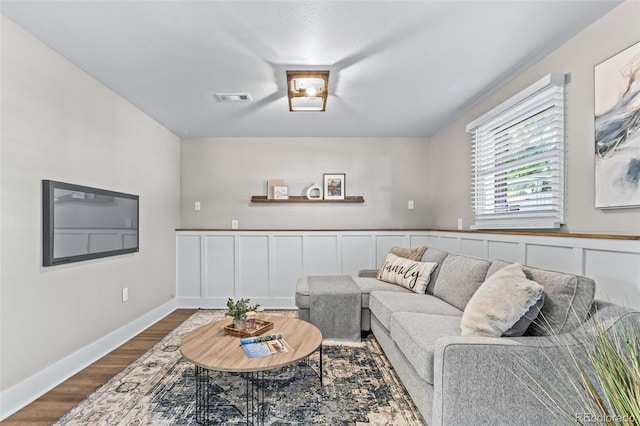 4512 S Yank St, Morrison, CO 80465 - living area featuring dark wood-style floors and baseboards