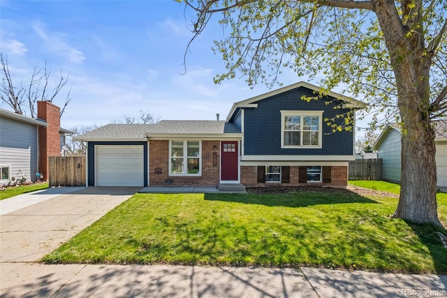 4512 S Yank St, Morrison, CO 80465 - split level home with a garage, brick siding, driveway, and roof with shingles