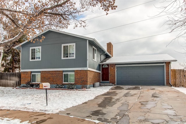 split level home with a garage