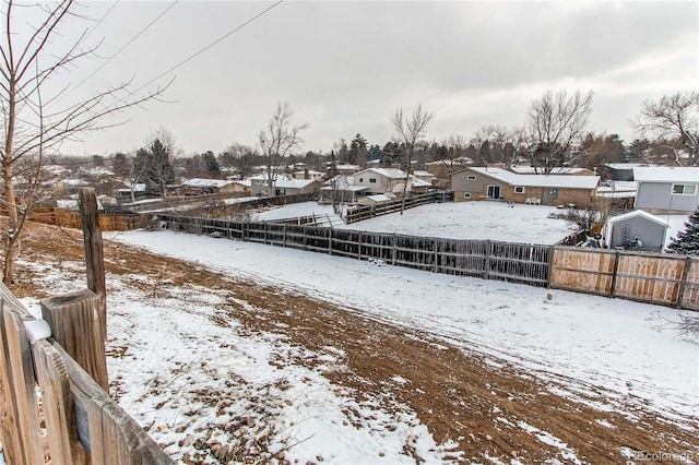 view of snowy yard