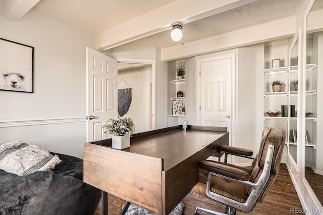 home office with a textured ceiling and wood finished floors