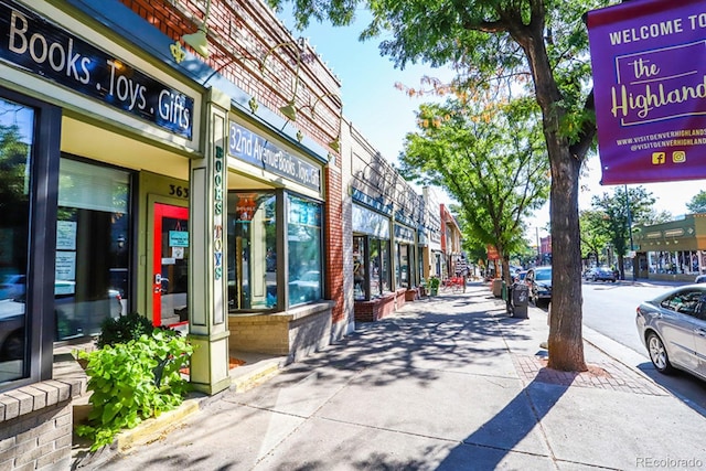 view of street featuring curbs and sidewalks