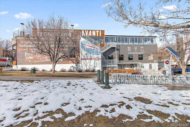 view of snow covered property