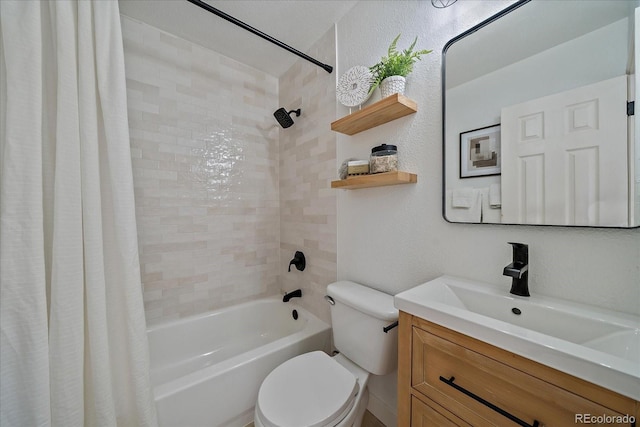 full bathroom with vanity, shower / tub combo, toilet, and a textured wall